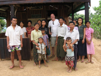 Charlie with a group of people in Myanmar